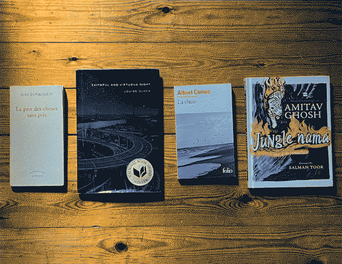 Four books lay on a wooden background. From right to left: Le prix des choses sans prix by Jean Duvignaud, Faithful and Virtuous Night by Louise Glück, La chute by Albert Camus, Jungle nama by Amitav Ghosh