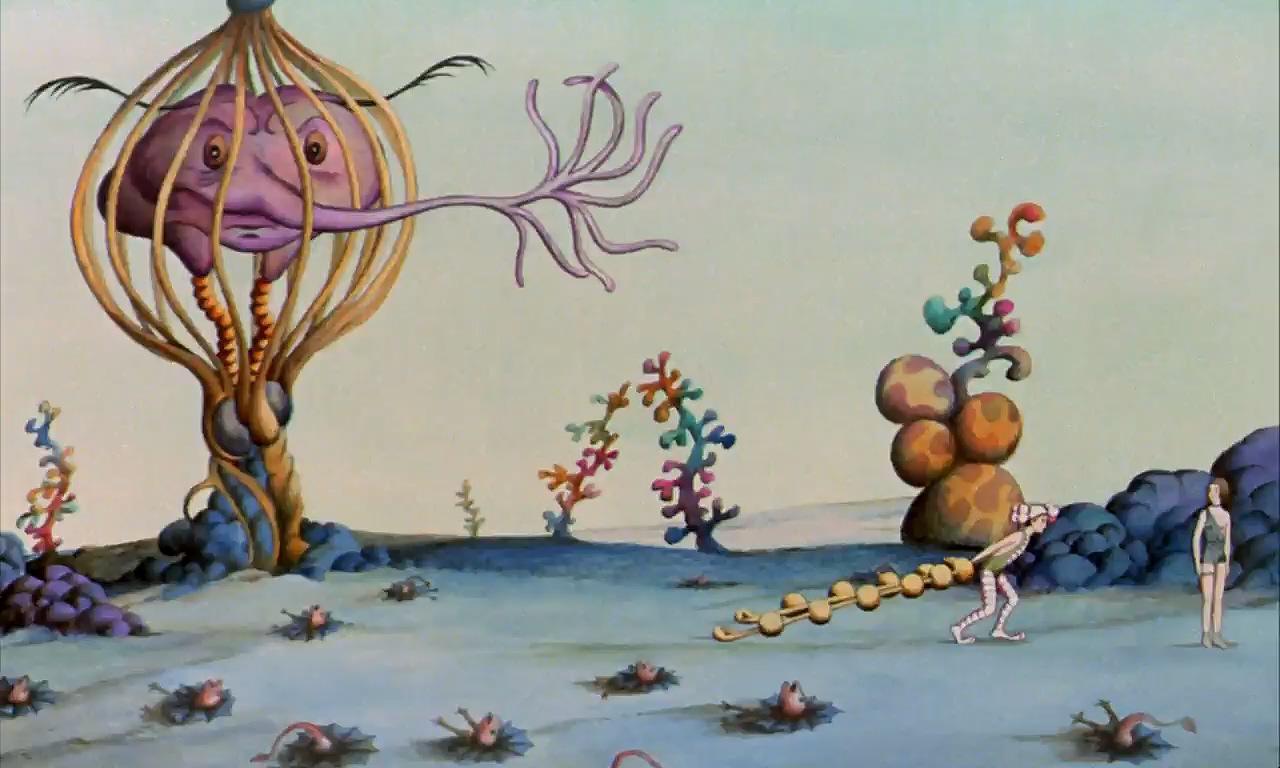 An almost desert landscape covered with alien rainbow plants and an odd pink creature in a vine-like cage. Two small humans walk and stand in the bottom right corner.